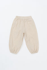 Avauma Breeze Jogger Pants in roseberry cream color, lightweight cotton pants with subtle dot pattern, flat lay view.